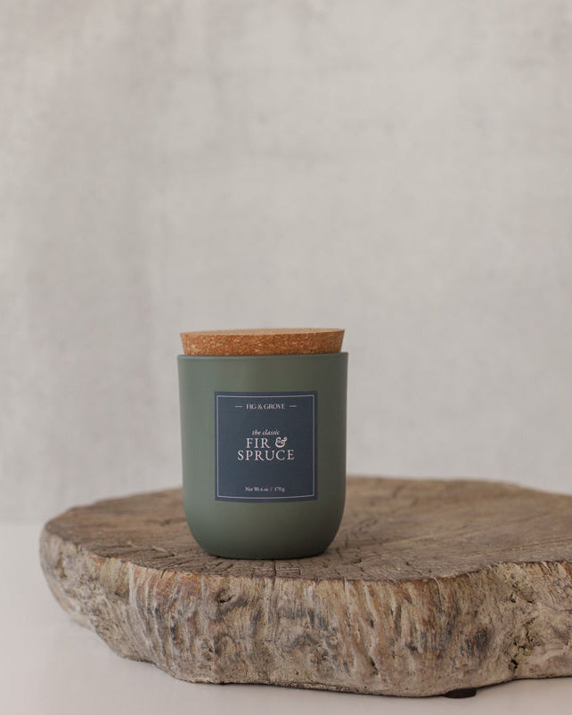 Fir & Spruce candle in sage green glass jar evoking fresh pine and winter woods – Fig & Grove