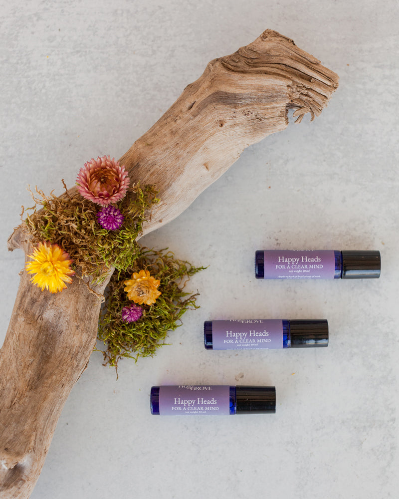 Fig & Grove Happy Heads natural head tension roller bottle — lavender and peppermint essential oil roller for head pressure and drowsiness relief, handmade in Copperopolis California, no synthetic ingredients
