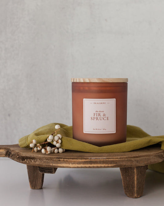 Fir & Spruce candle in brown glass jar evoking fresh pine and winter woods – Fig & Grove