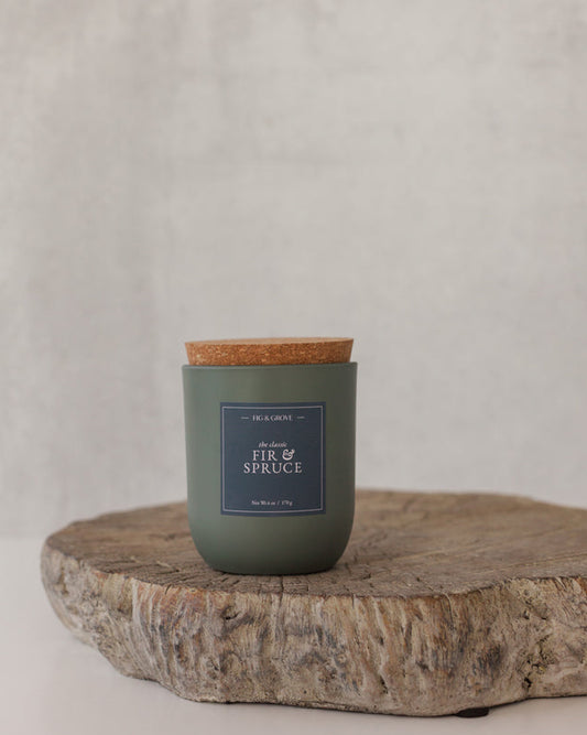 Fir & Spruce candle in sage green glass jar evoking fresh pine and winter woods – Fig & Grove