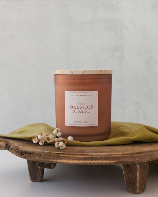 Hand-poured Oak Moss & Sage candle in frosted glass vessel – earthy essential oil blend with notes of sage, citrus, and oakmoss