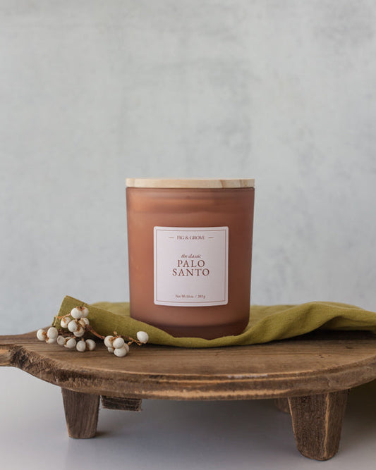 Grounding Palo Santo soy wax candle in 10 oz glass jar