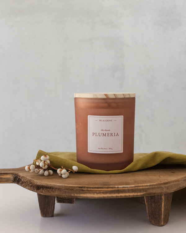 Plumeria tropical floral candle by Fig & Grove with peach and coconut notes