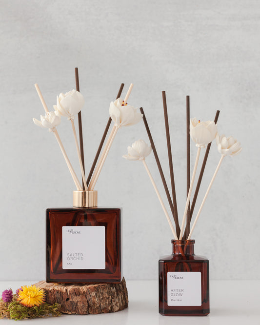 Fig & Grove reed diffuser styled with flower reeds for a bathroom, bedroom, or entryway